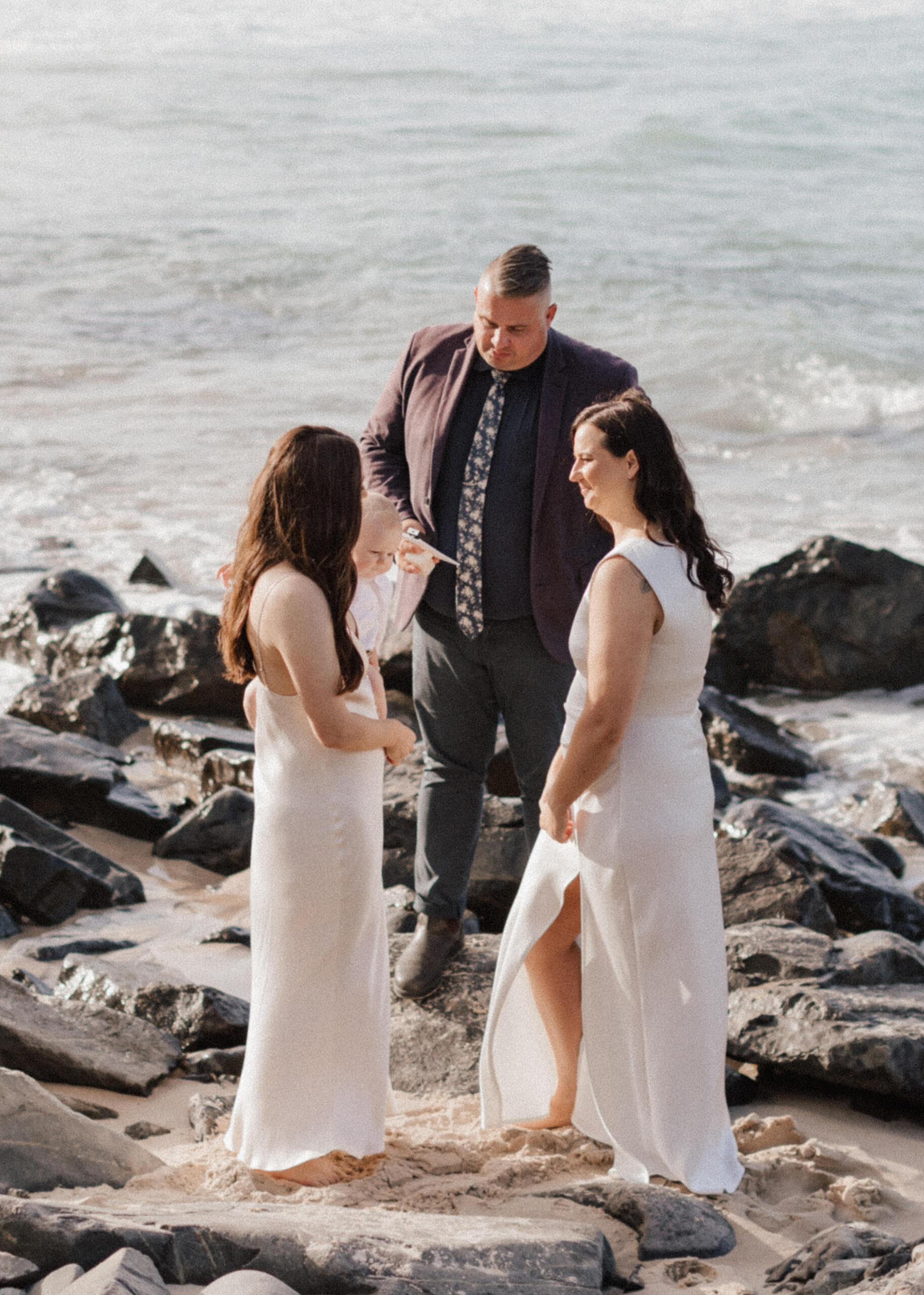 Josh Withers, wedding celebrant, marrying a couple on the beach